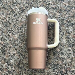 Stanley Rose Gold Travel Mug with White Handle